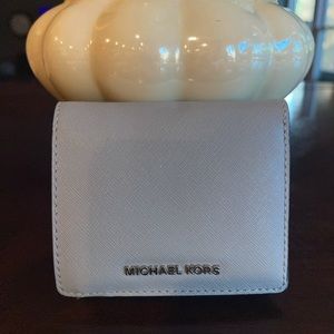 Michael Kors small leather wallet with coin holder. Only used once.
